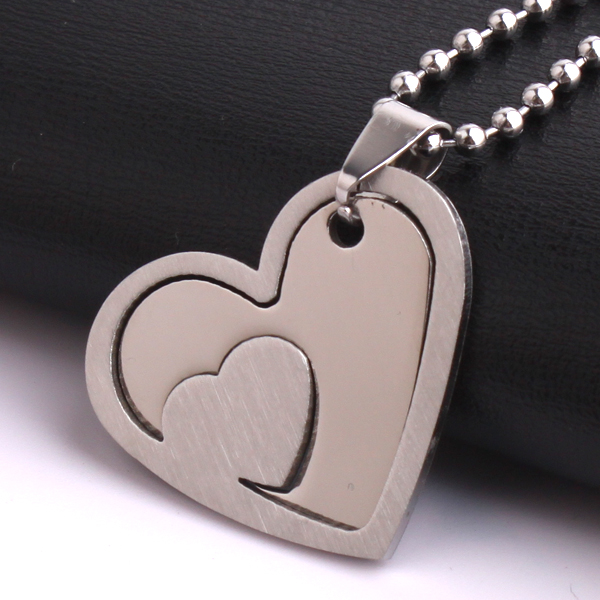 8(499)9387578 Купить кулон сердце в сердце 2 части серебряного цвета ювелирная сталь 316l от  - заказать